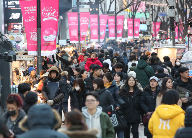 Myeongdong bustles with tourists during the 2019 Korea Grand Sale. (Yonhap)