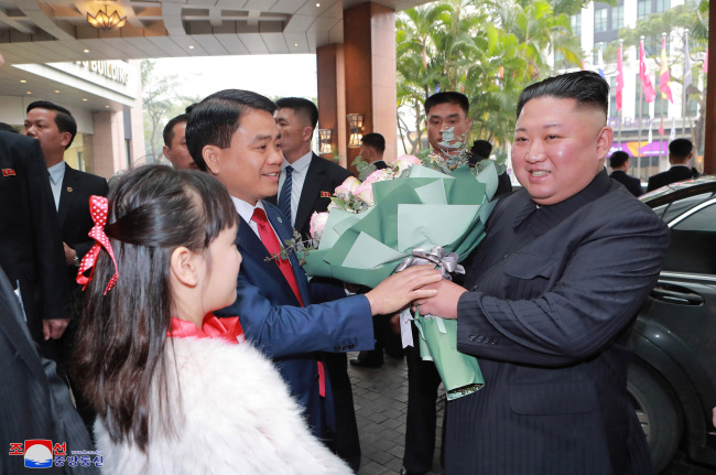 North Korean leader Kim Jong-un receives a warm welcome from Vietnamese citizens upon his arrival in Hanoi on Tuesday. (KCNA)