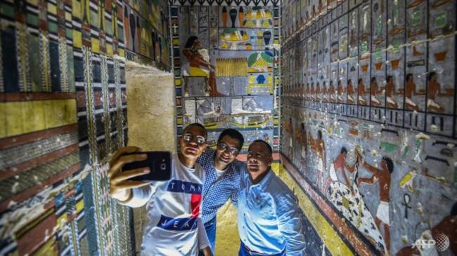 Archaelogists inside the newly discovered tomb of Khuwy, who is believed to have been a nobleman during the Fifth Dynasty, which ruled over Egypt about 4300 years ago. (AFP)