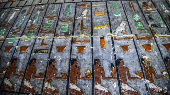 The tomb is mostly made of white limestone bricks, and ornate paintings boast a special green resin throughout. (AFP)