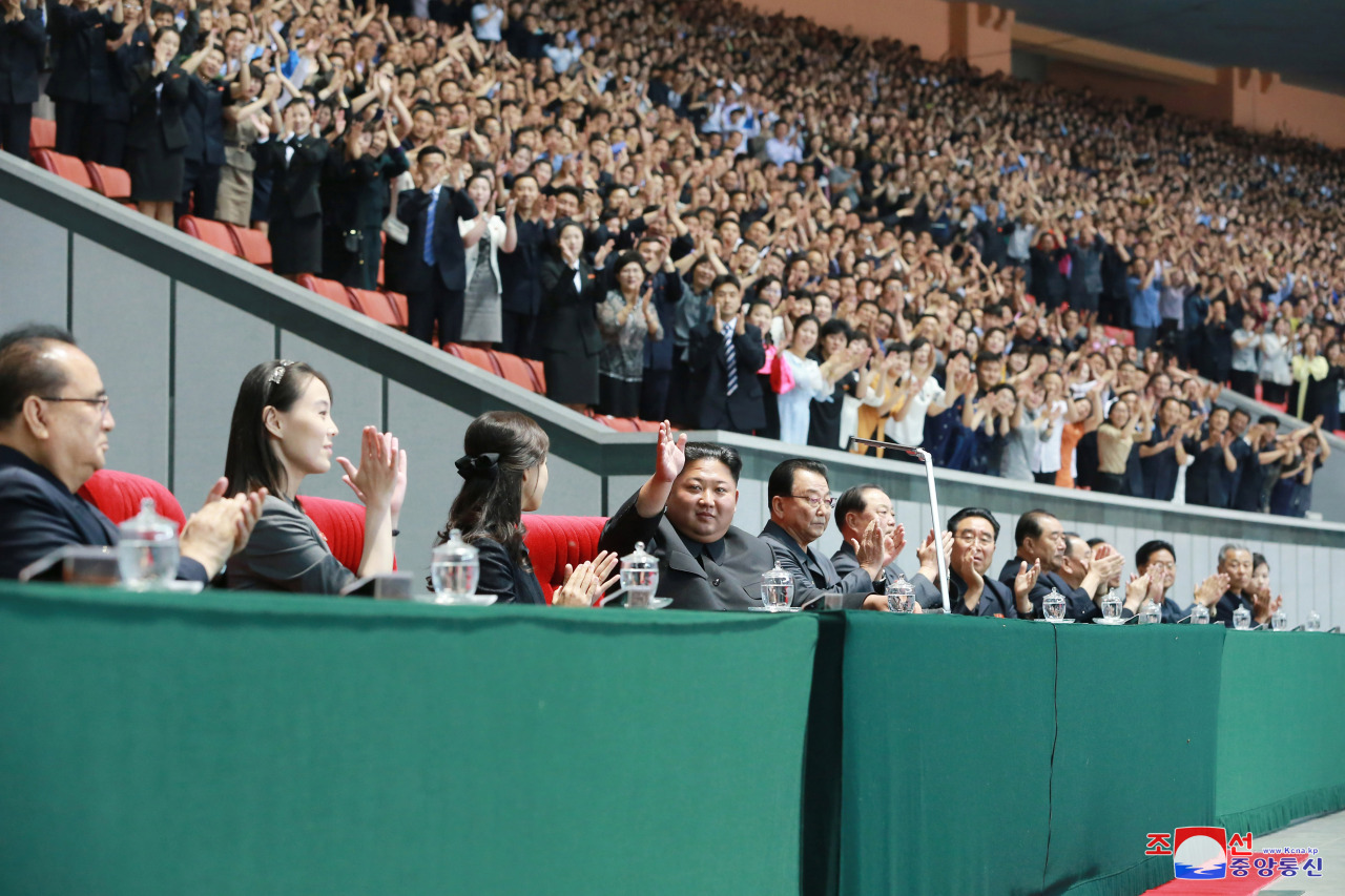 North Korean leader Kim Jong-un (4th from L), watches a propaganda group gymnastics and artist performance called "The Land of the People," at the May Day Stadium in Pyongyang on June 3, 2019, in this photo released by the North's official Korean Central News Agency on June 4. (For Use Only in the Republic of Korea. No Redistribution) (Yonhap)