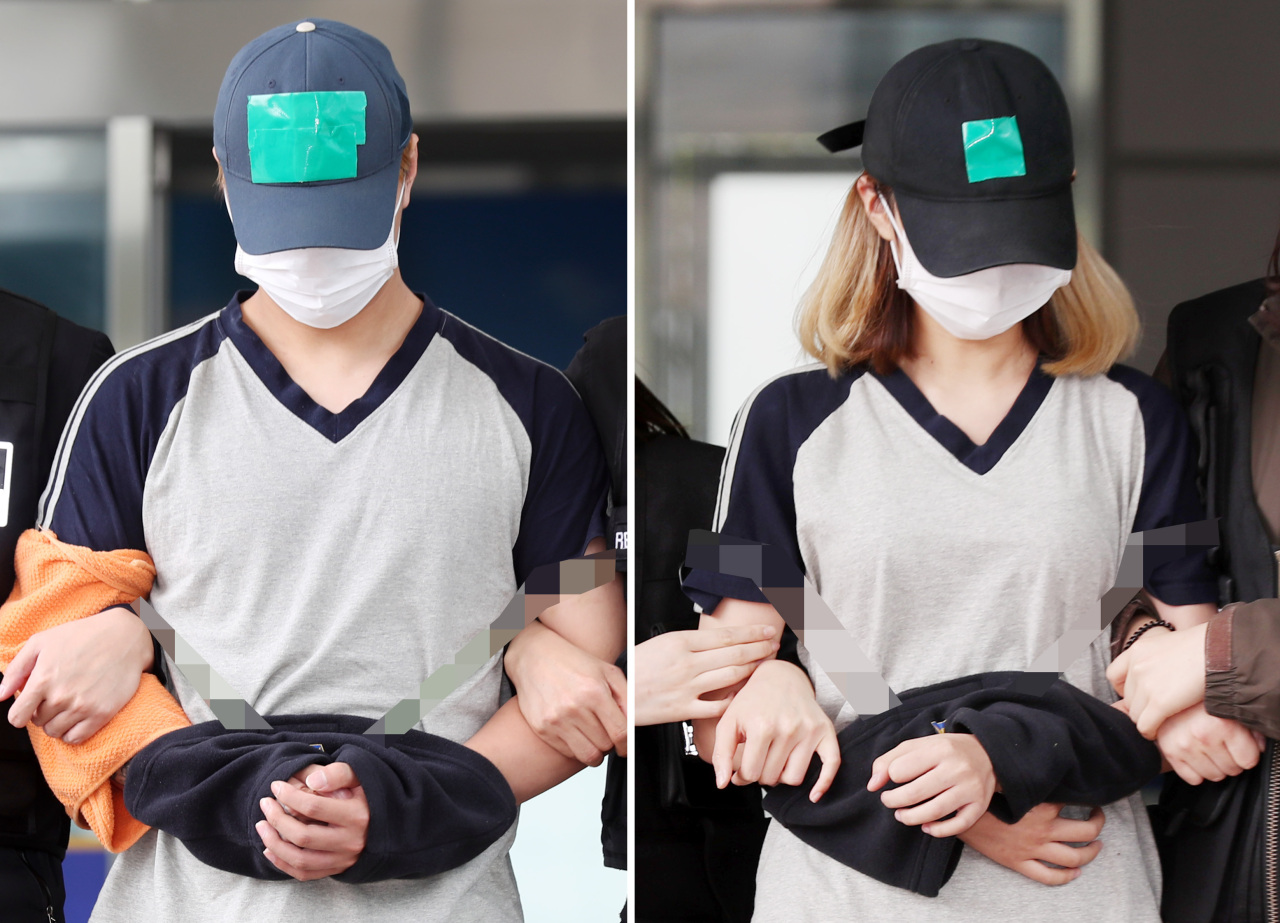 A couple accused of neglecting their 7-month-old daughter and causing her death are transported to the Incheon District Court on Friday. (Yonhap)