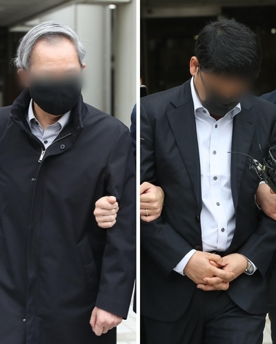 Doctors accused of concealing the cause of newborn's death leave Seoul Central District Court in Seocho-gu, Seoul. (Yonhap
