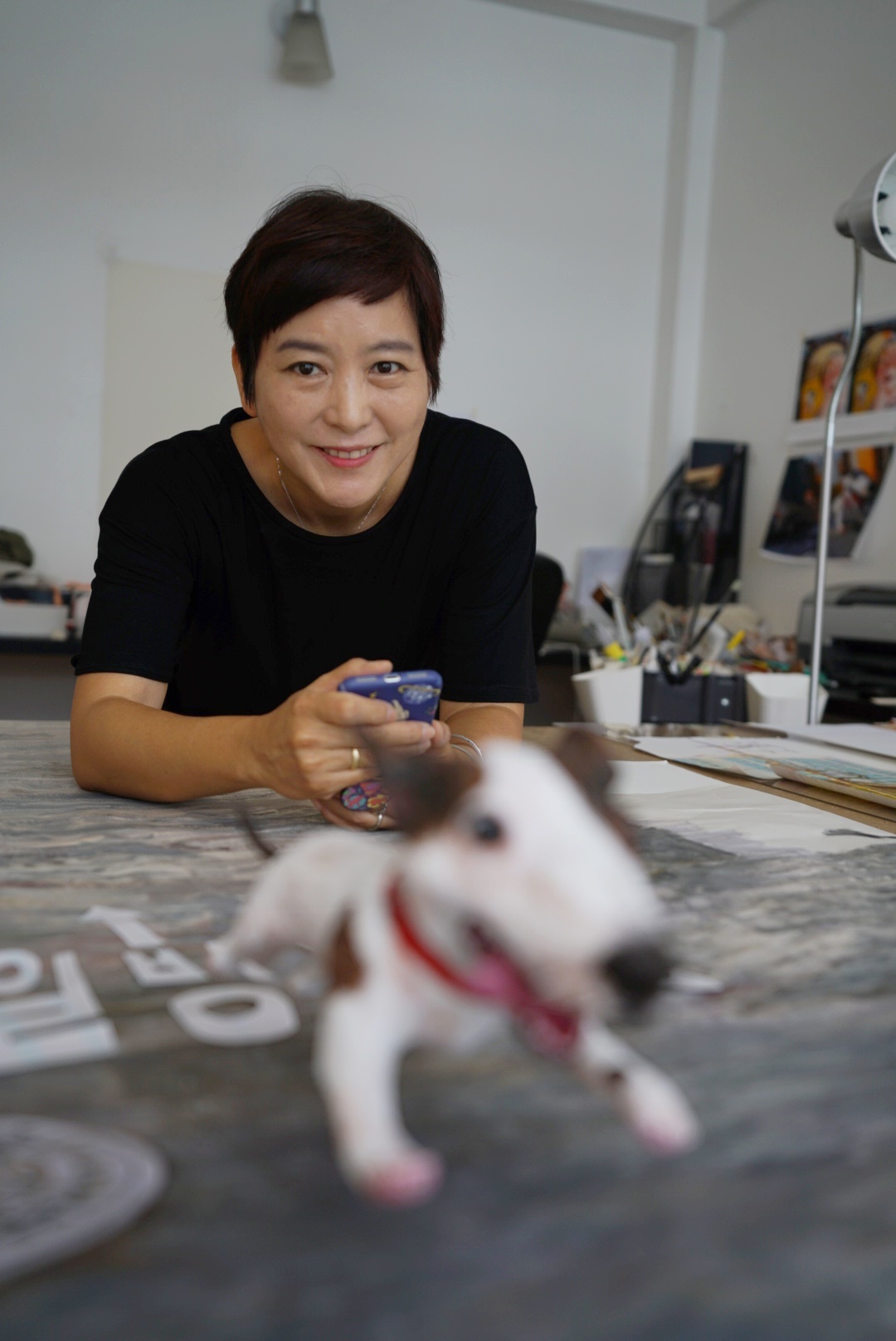 Baek Hee-na, author and illustrator of "Magic Candies" "Cloud Bread," with the main character of her latest book "I Am a Dog." (Photo provided by the author)