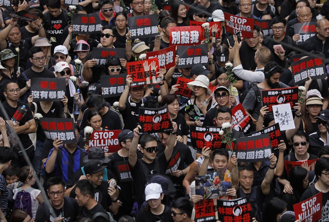 Protesters march on the streets against an extradition bill in Hong Kong on Sunday, June 16, 2019. Hong Kong residents Sunday continued their massive protest over an unpopular extradition bill that has highlighted the territory`s apprehension about relations with mainland China, a week after the crisis brought as many as 1 million into the streets. (AP)