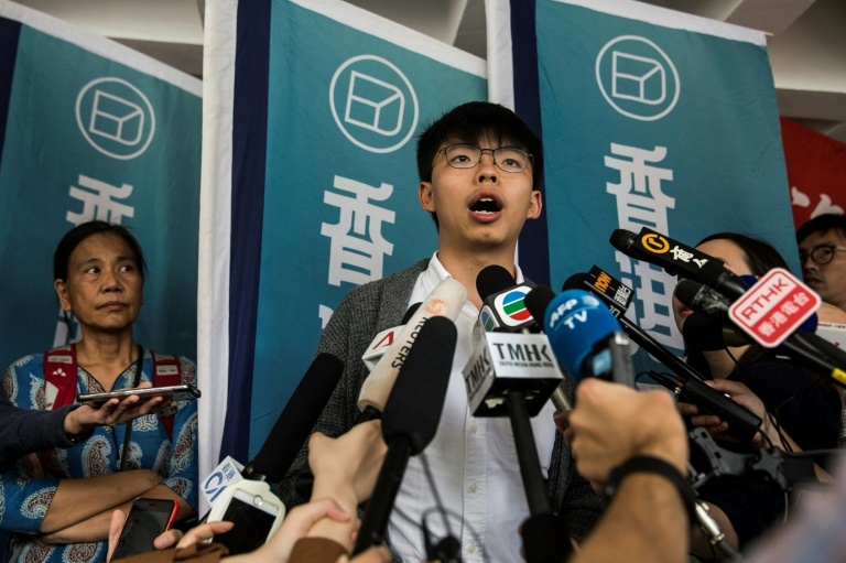 Joshua Wong, who became the poster child of the 2014 "Umbrella Movement" protests, will walk free from prison on Monday. (AFP)