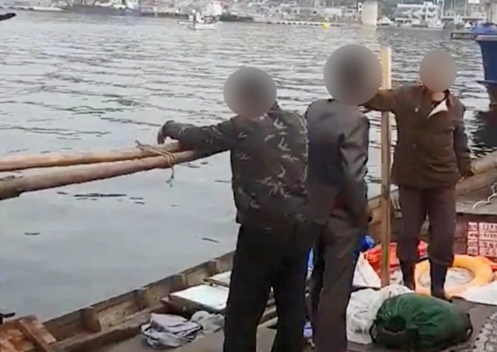 This photo provided by a civilian shows North Koreans who arrived at the port of Samcheok, Gangwon Province, undetected on June 15, 2019. (Yonhap)