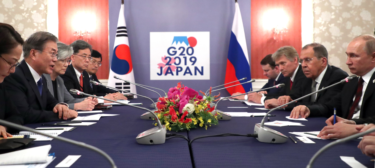 President Moon Jae-in and Russian President Vladimir Putin hold a summit meeting in Osaka, Japan on Saturday. Yonhap
