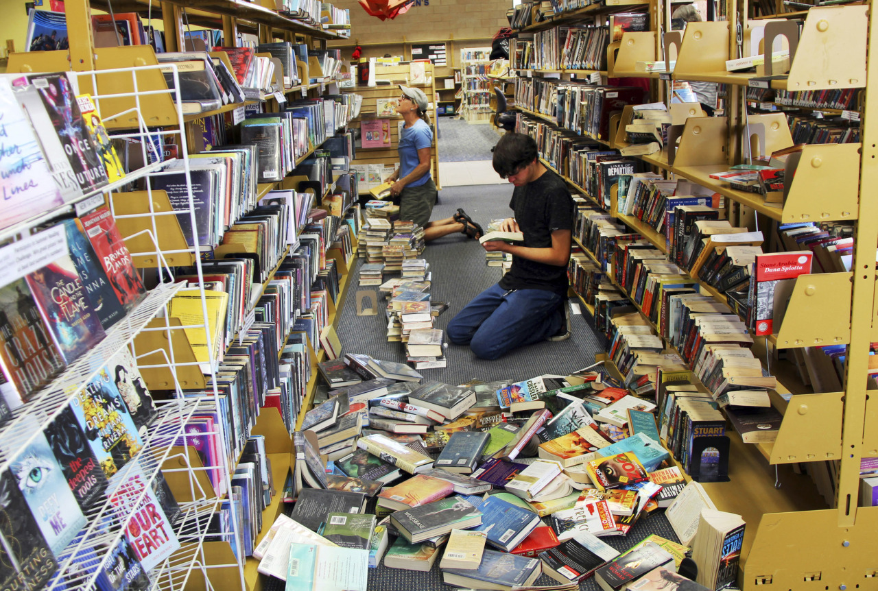 Volunteers assist with cleanup at the Ridgecrest, Calif., branch of the Kern County Library on Friday, July 5, 2019, following a 6.4 magnitude earthquake that shook the region about 240 kilometers northeast of Los Angeles Thursday. (AP)