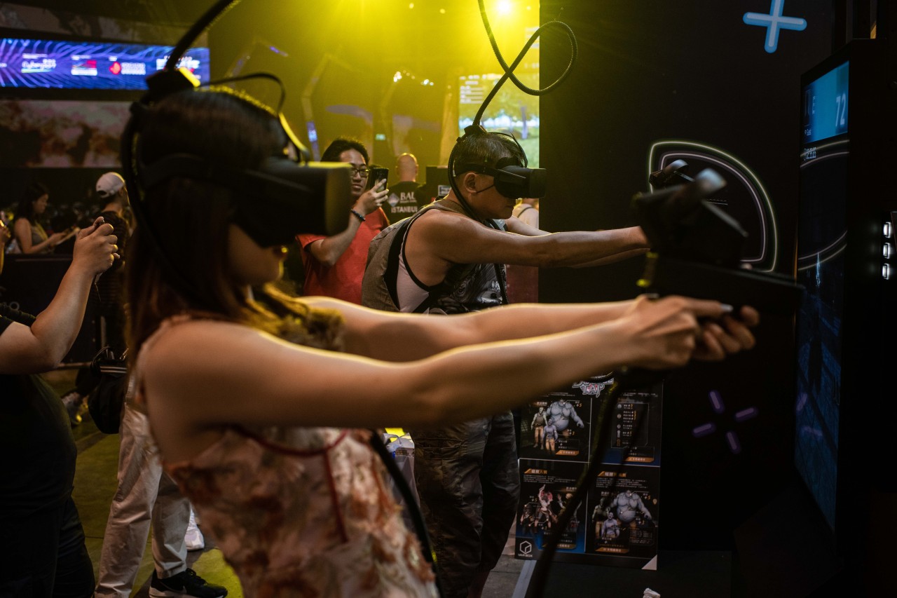 A woman plays virtual reality game during the E-Sports and Music Festival Hong Kong 2019 on Friday in Hong Kong. (Hong Kong Tourism Board)