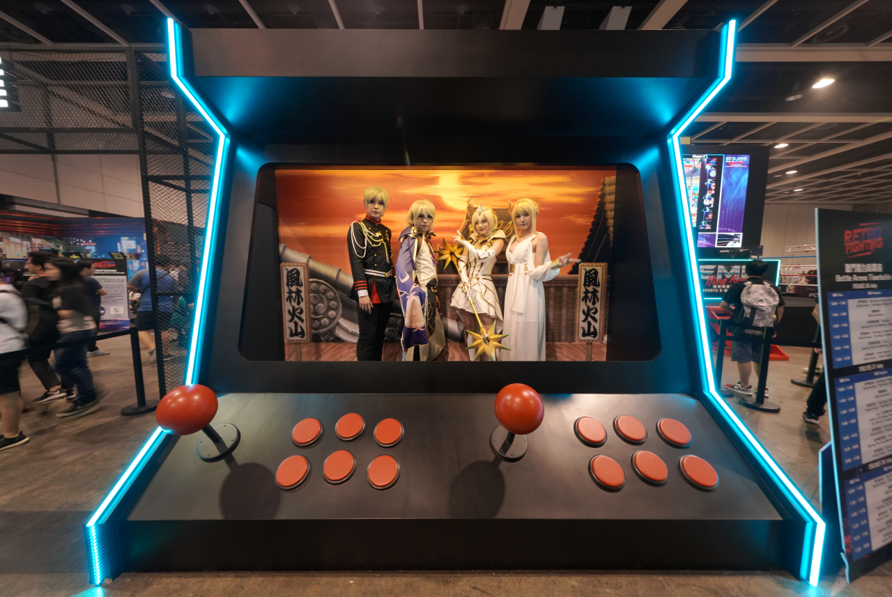 Guests posing for photographs at Retro Fighting Gaming Zone during the E-Sports and Music Festival Hong Kong 2019 on Friday in Hong Kong. (Hong Kong Tourism Board)