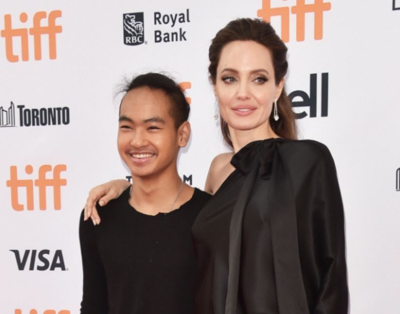 Angelina Jolie, left, and her son Maddox (AFP)