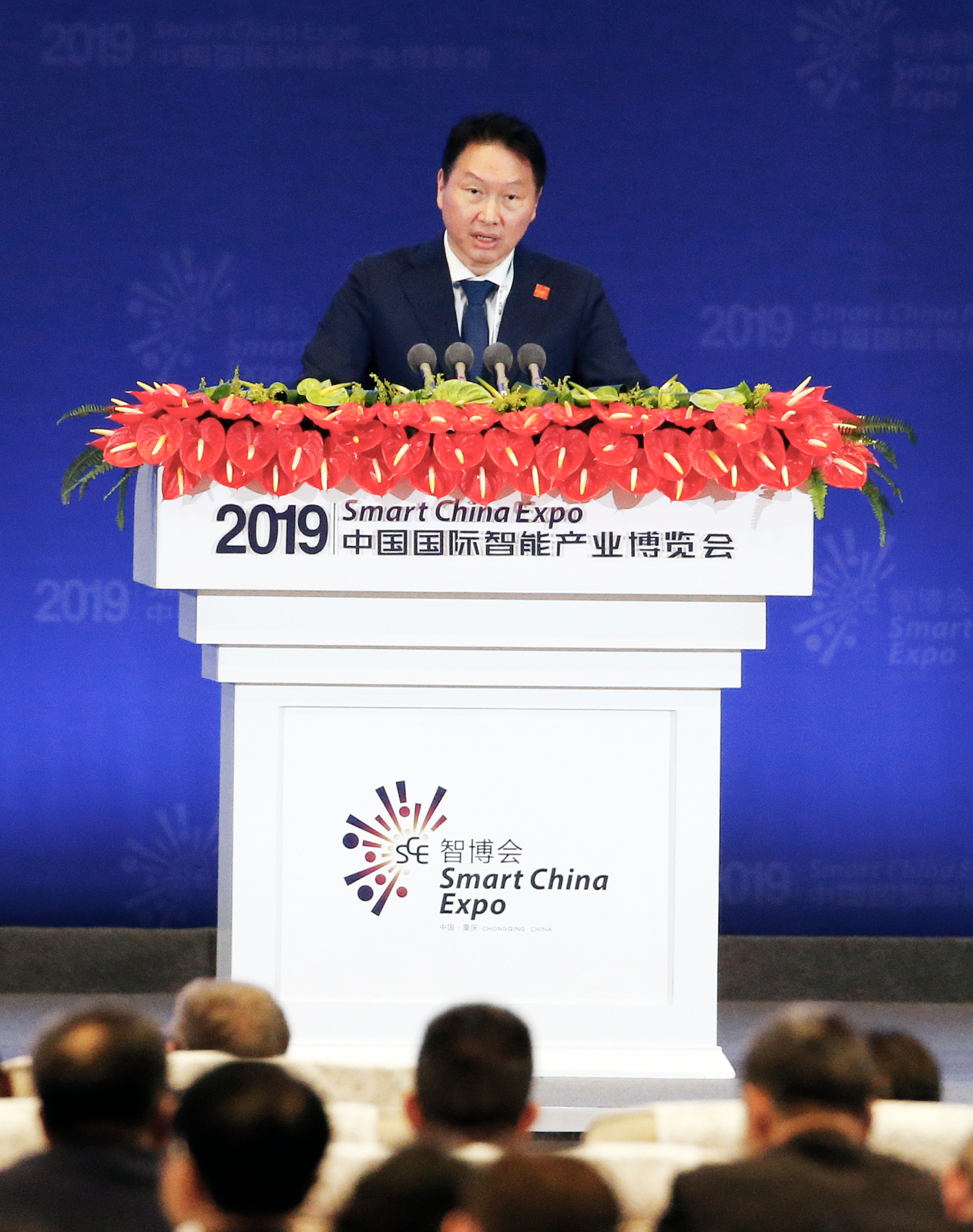 SK Group Chairman Chey Tae-won speaks at the opening ceremony of the Smart China Expo in Chongqing on Monday. (SK Group)