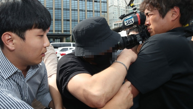 홍대입구 인근에서 일본인 여성을 폭행했다는 혐의를 받고 있는 B 씨. [연합뉴스]