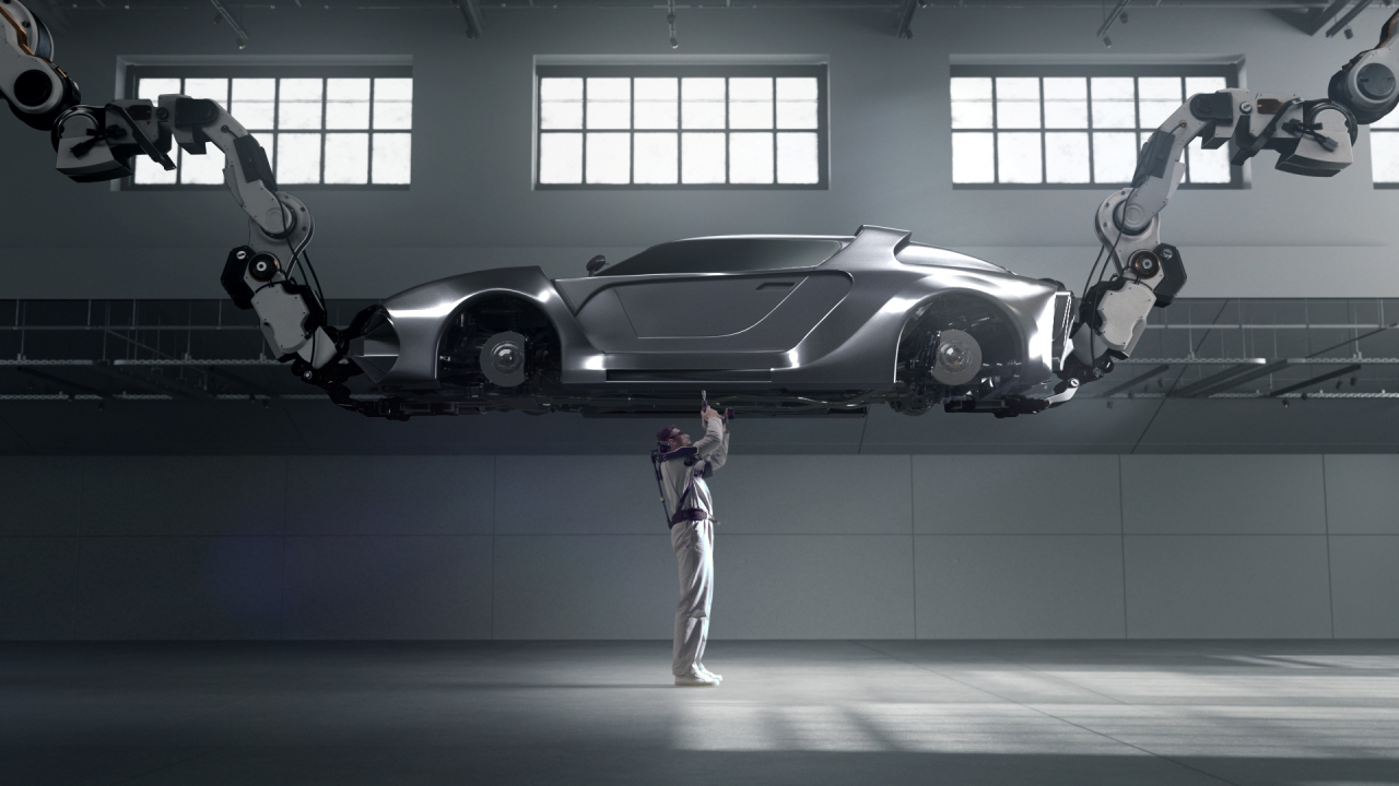 현대차·기아차가 개발한 장시간 일하는 근로자들을 보조하는 웨어러블 로봇 ‘벡스(VEX· Vest Exoskeleton)’. 벡스를 착용하면 근로자들의 근골격계 질환을 크게 줄일 수 있고 작업 효율도 올라간다. [현대차제공]