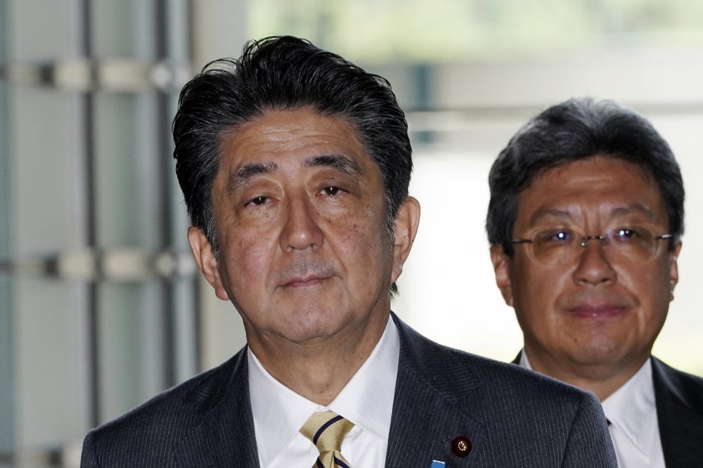 Japanese Prime Minister Shinzo Abe enters his official residence in Tokyo Wednesday, Sept. 11, 2019. (AP)