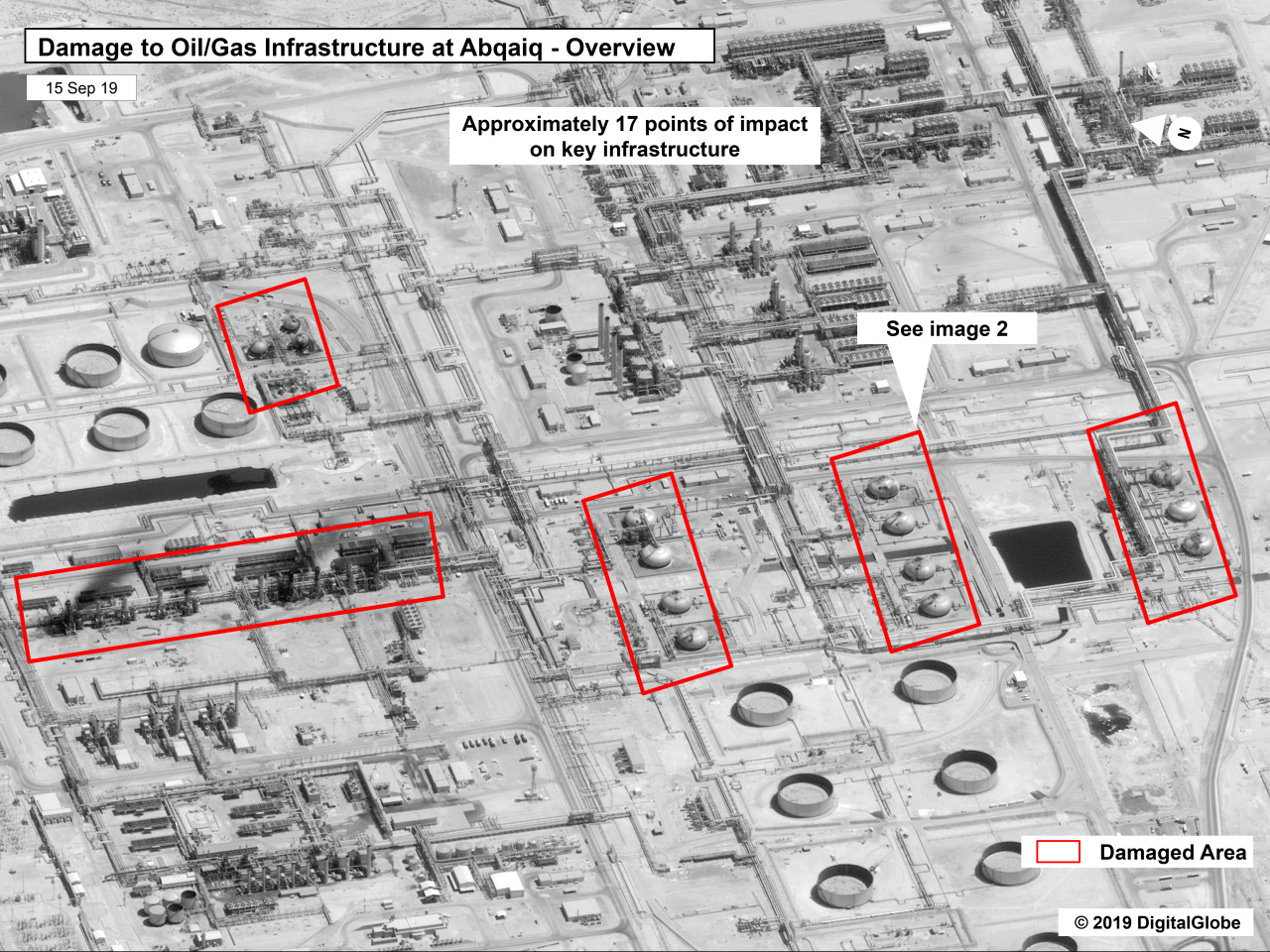 This image provided Sunday by the US government and DigitalGlobe and annotated by the source, shows damage to the infrastructure at Saudi Aramco's Abaqaiq oil processing facility in Buqyaq, Saudi Arabia. (AP-Yonhap)