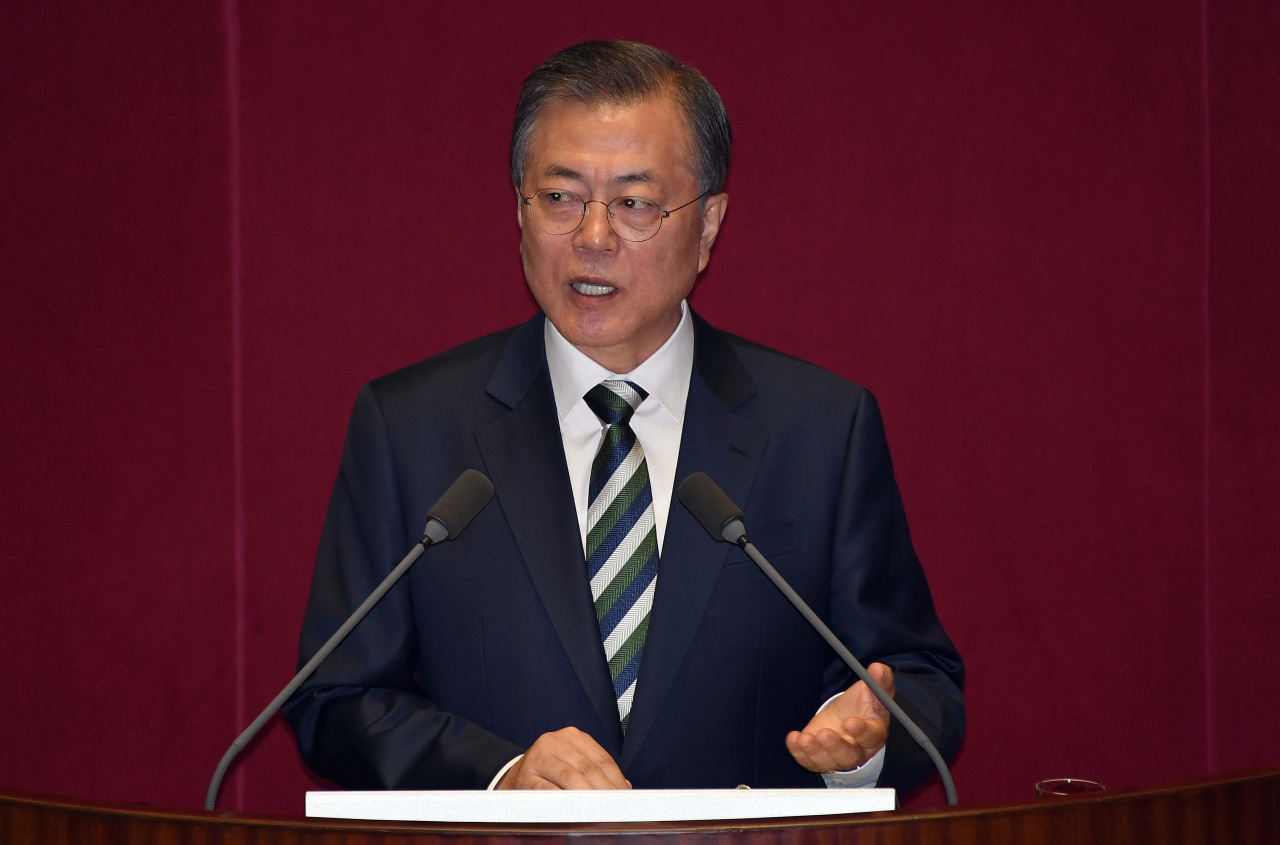 President Moon Jae-in addresses the parliament on Tuesday. Yonhap