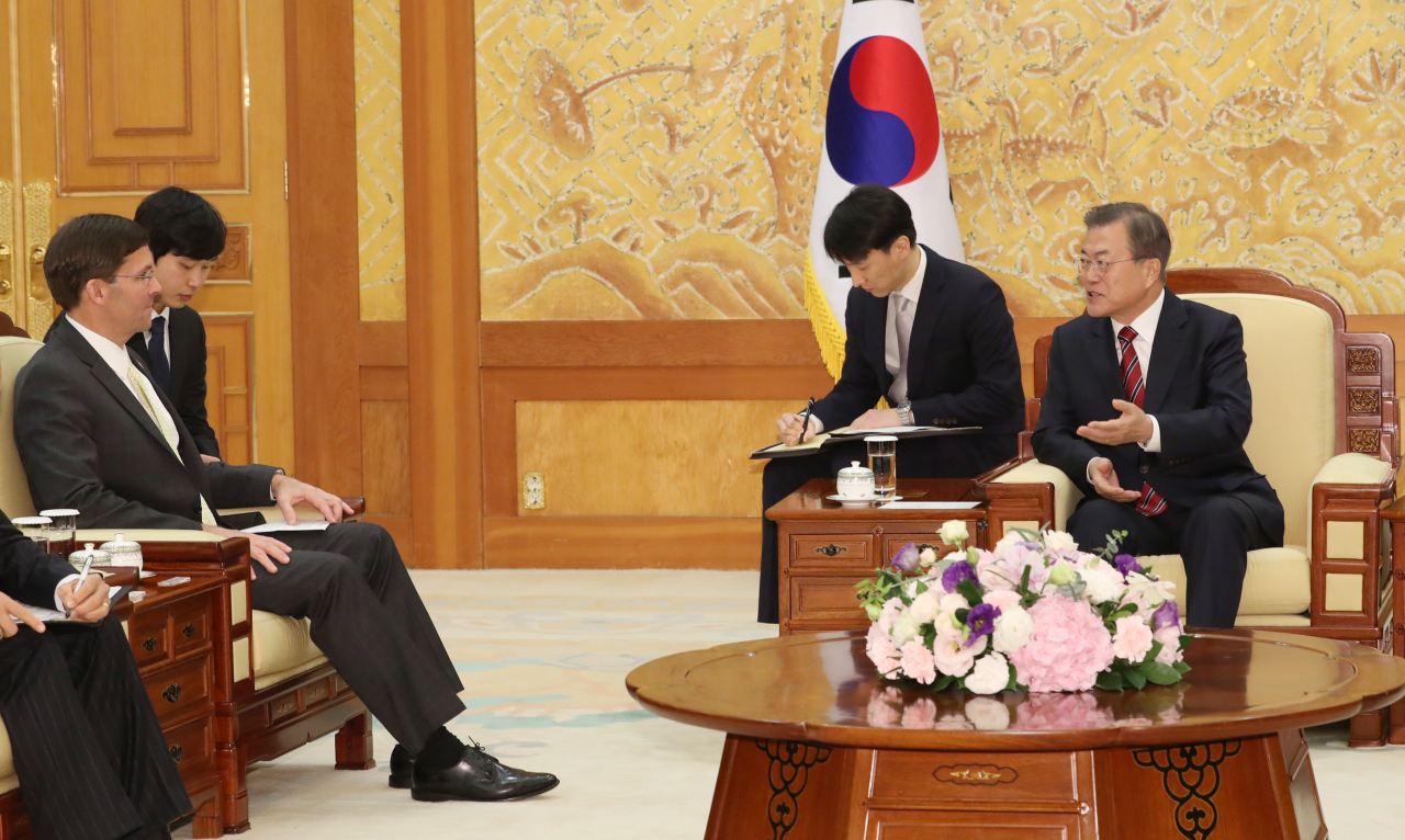 President Moon Jae-in meets with US Defense Secretary Mark Esper at the presidential office on Friday. Yonhap