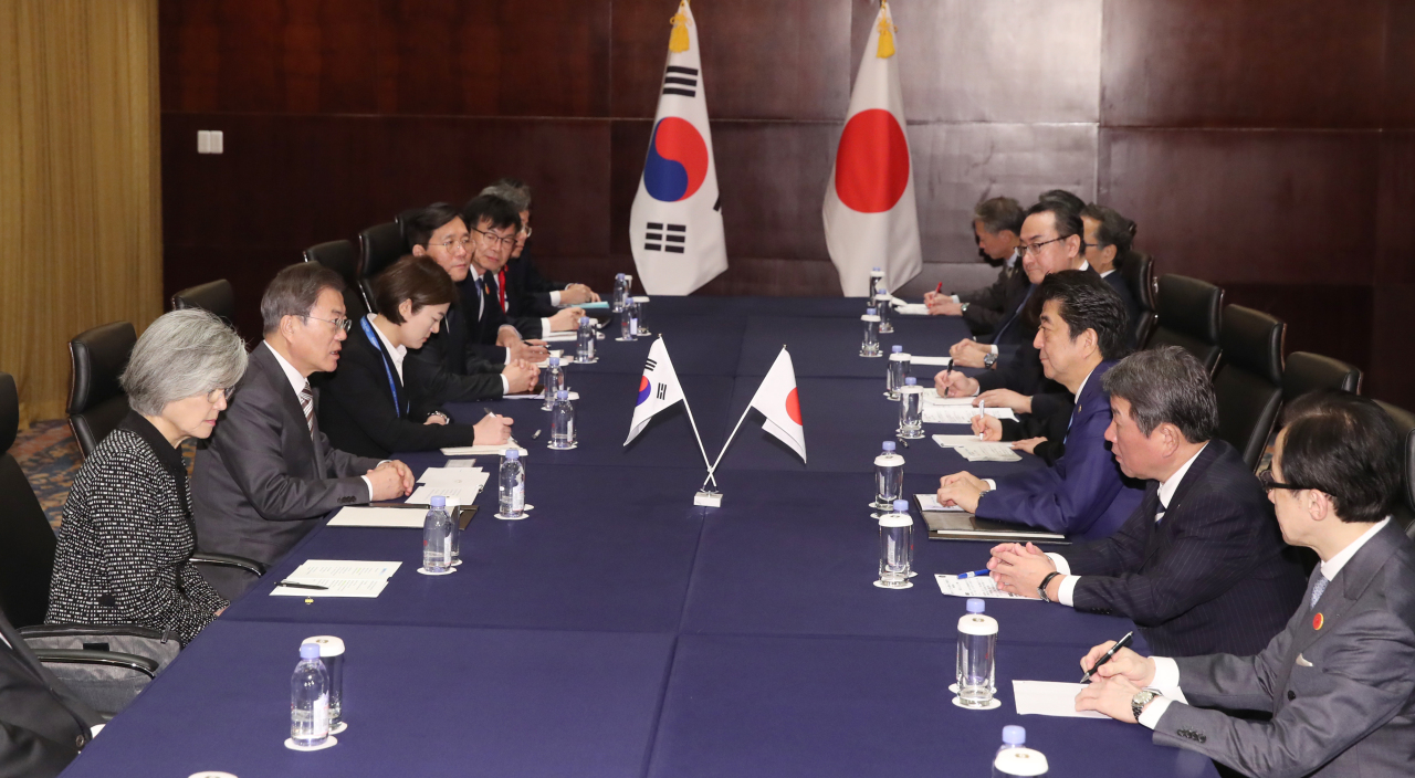 South Korean President Moon Jae-in speaks during the summit with Japanese Prime Minister Shinzo Abe at a hotel in Chengdu, China, on Tuesday. (Yonhap)