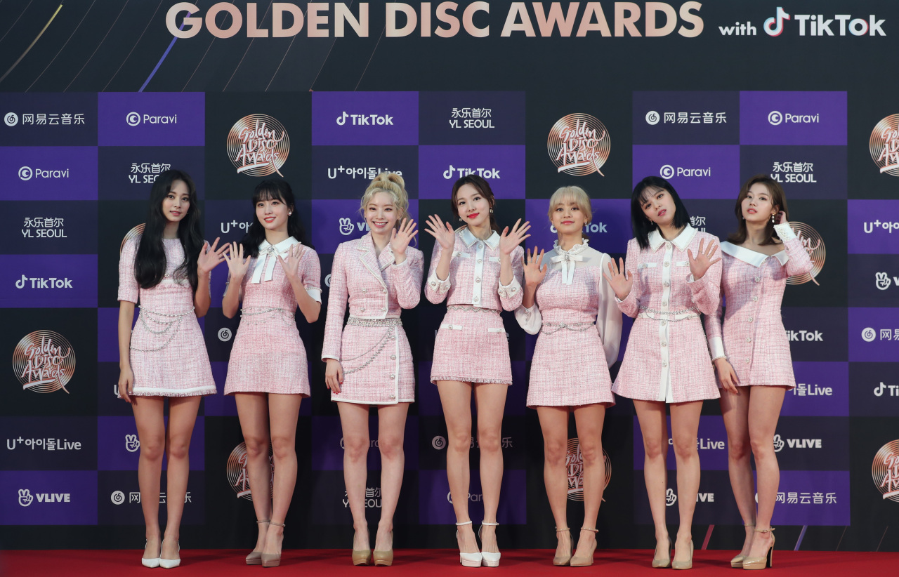 Members of Twice pose for photos at the 34th Golden Disc Awards ceremony in Seoul on Jan. 5. (Yonhap)