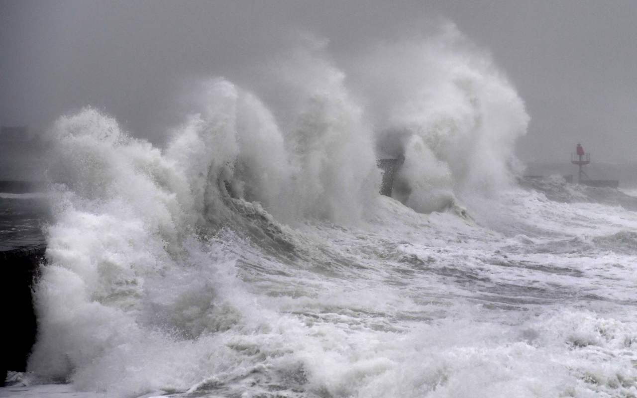 Waves hit a jetty in Plobannalec-Lesconil, western Franceon February 9, 2020 as Storm Ciara sweeps across western Europe.  (AFP-Yonhap)