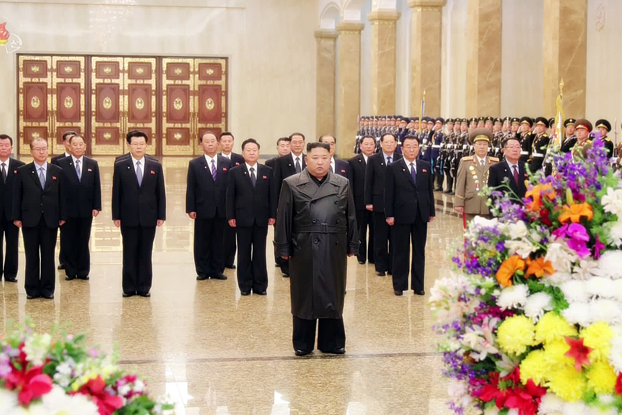 This footage from North Korea’s state-run media KCNA on Sunday shows leader Kim Jong-un paying tribute to his late father, Kim Jong-il, at the Kumsusan Palace of the Sun in Pyongyang. (Yonhap)