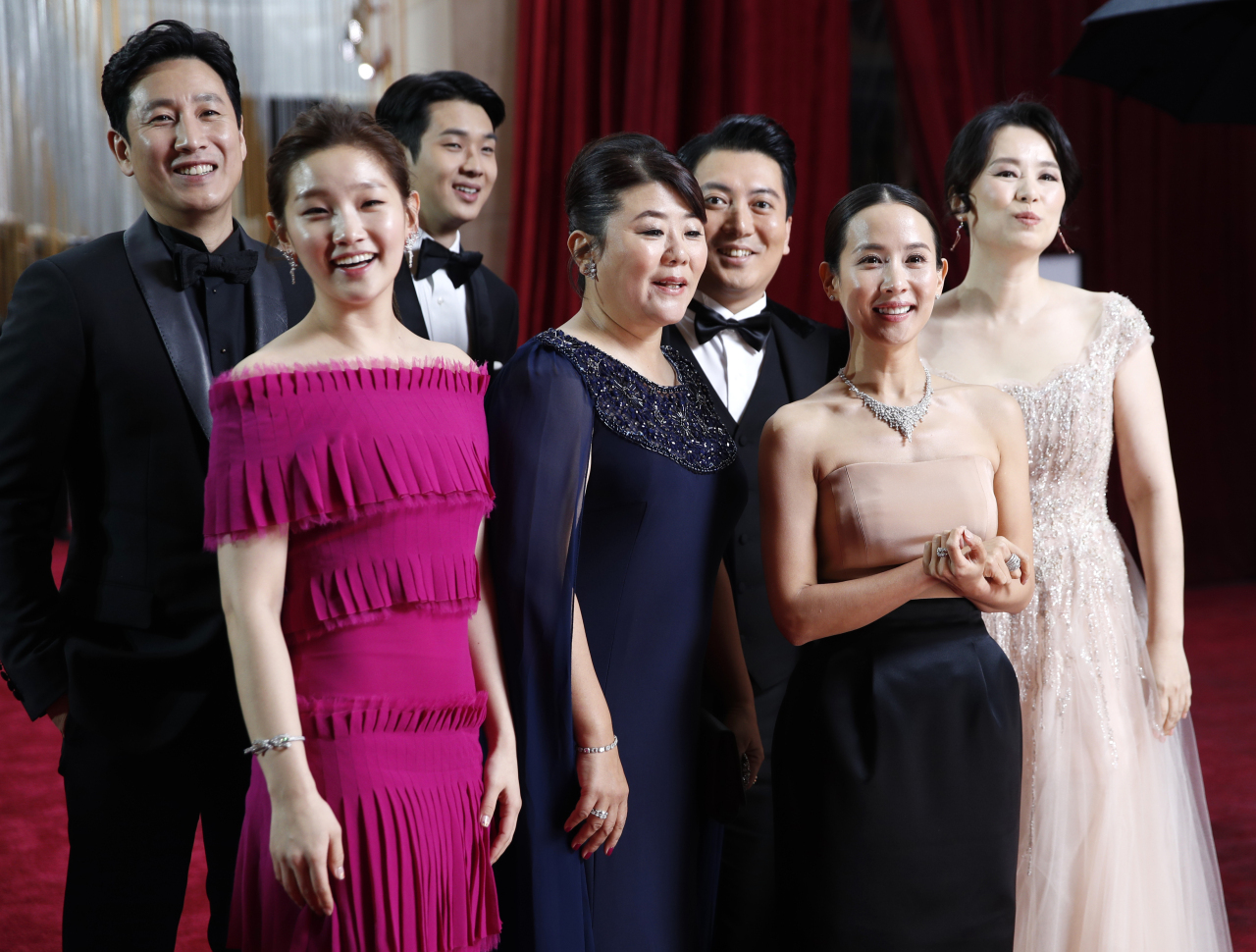 The cast of “Parasite” poses at the Academy Awards on Feb. 9. (Reuters - Yonhap)