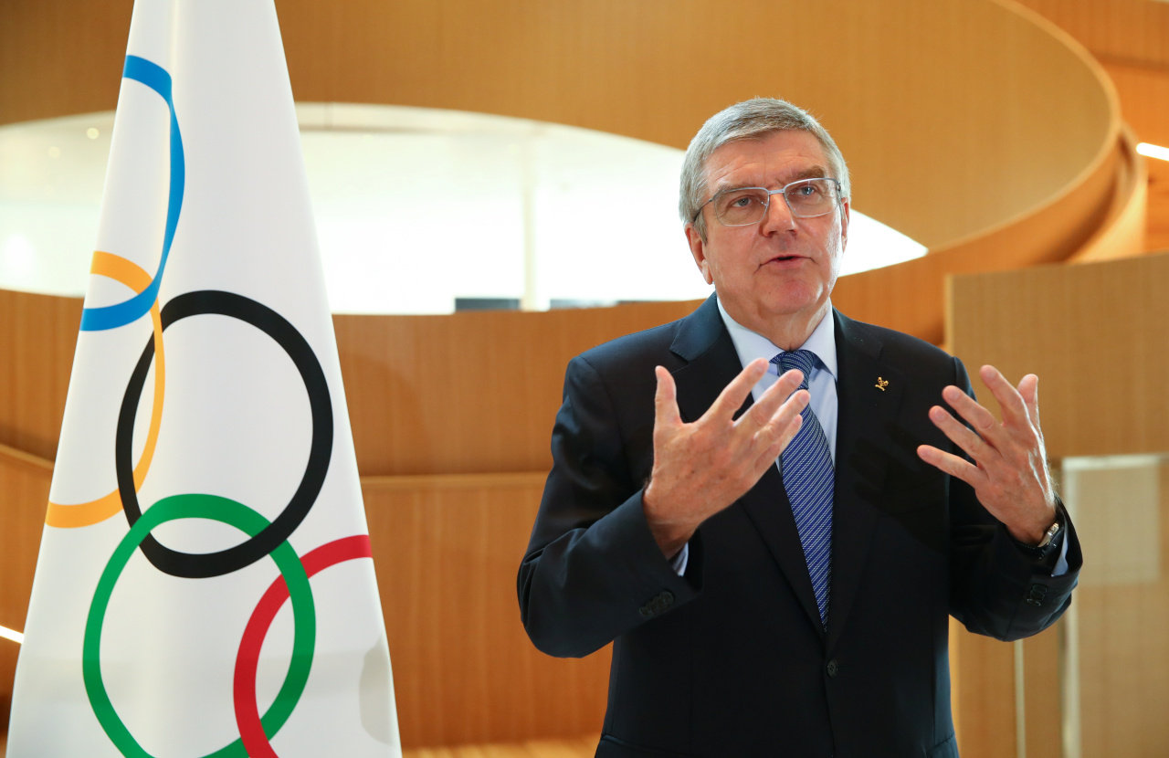 International Olympic Committee (IOC) President Thomas Bach attends an interview after after the historic decision to postpone the 2020 Tokyo Olympic Games due to the coronavirus pandemic, in Lausanne, Switzerland, on March 25, 2020. (AFP-Yonhap)