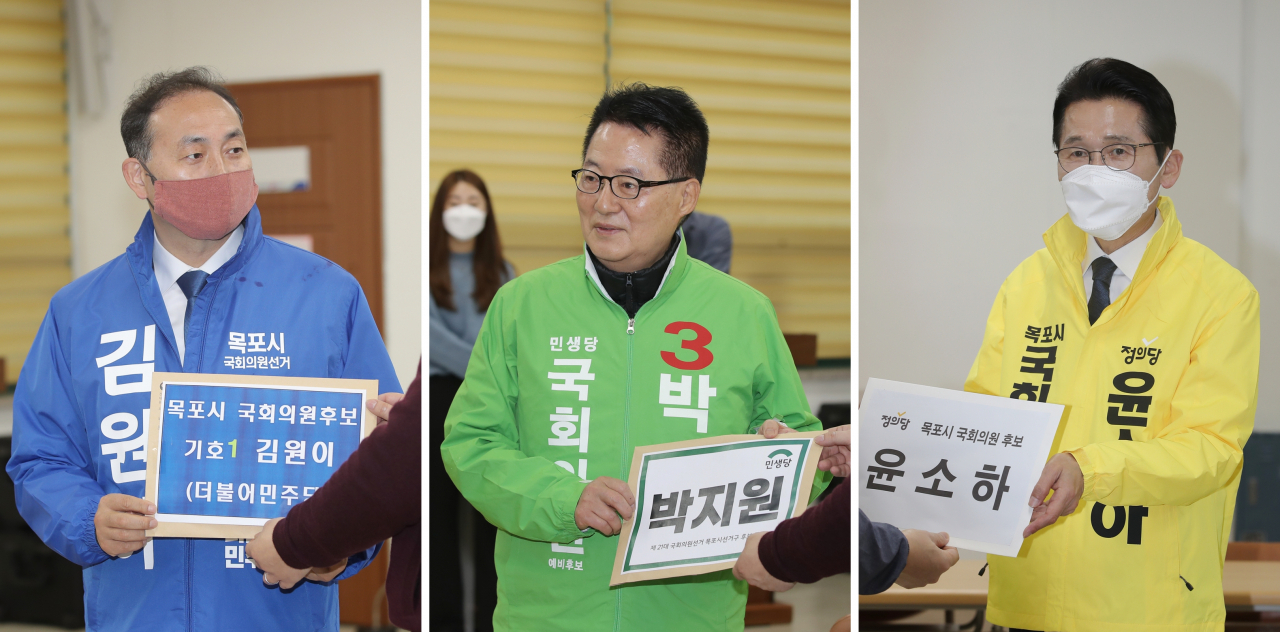 제21대 국회의원 총선거 후보 등록이 시작된 26일 오전 전남 목포시선거관리위원회에서 후보들이 후보 등록을 하고 있다. 사진 왼쪽부터 더불어민주당 김원이, 민생당 박지원, 정의당 윤소하 후보. [연합]