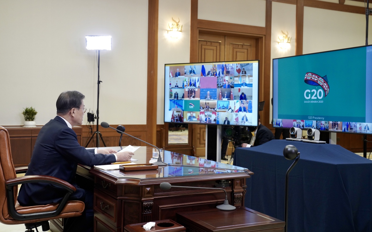 South Korean President Moon Jae-in speaks during a teleconference with G-20 leaders amid the coronavirus outbreak. (Yonhap)