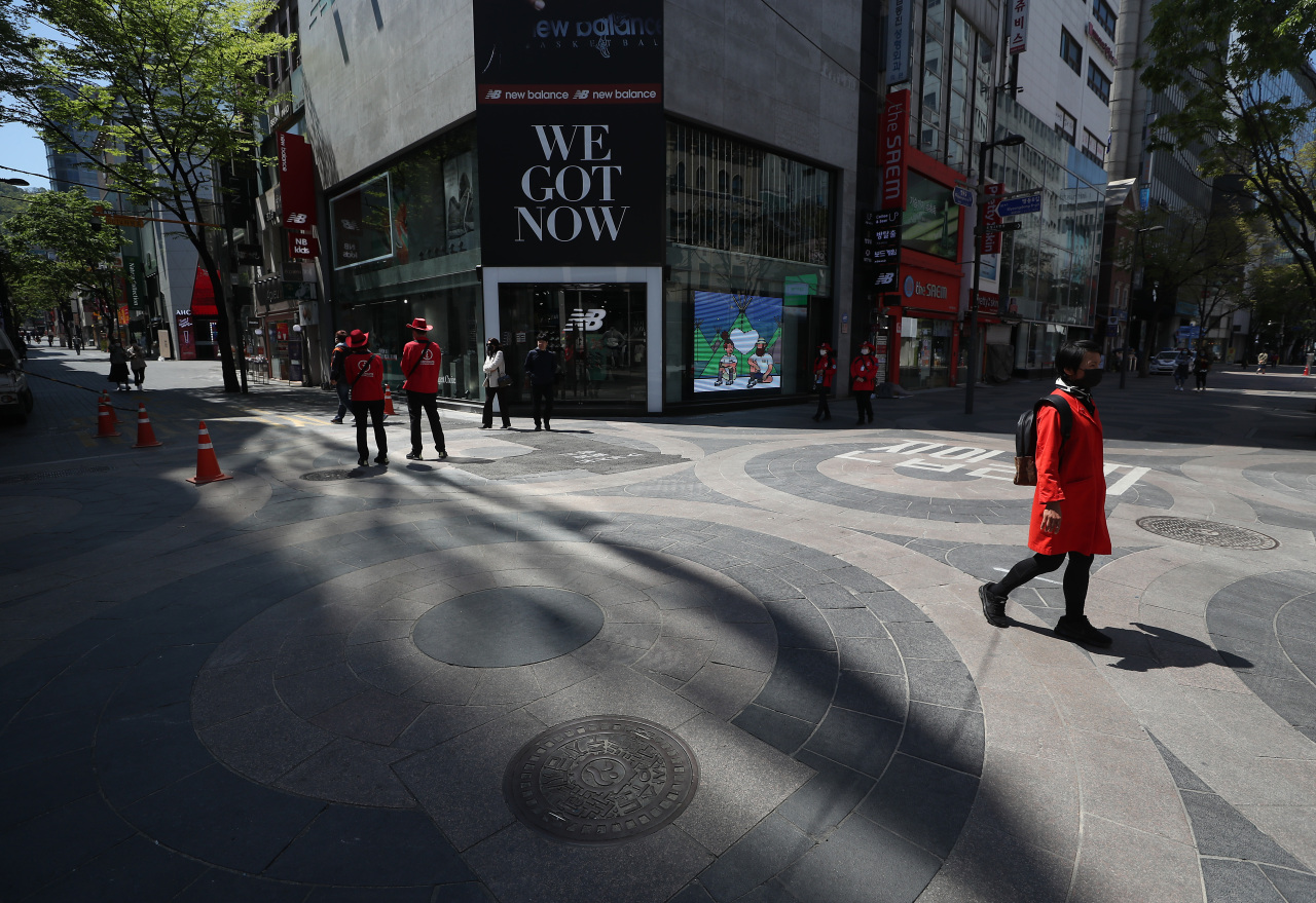 A street in Myeongdong, a tourist district in central Seoul, appears empty Sunday morning. (Yonhap)