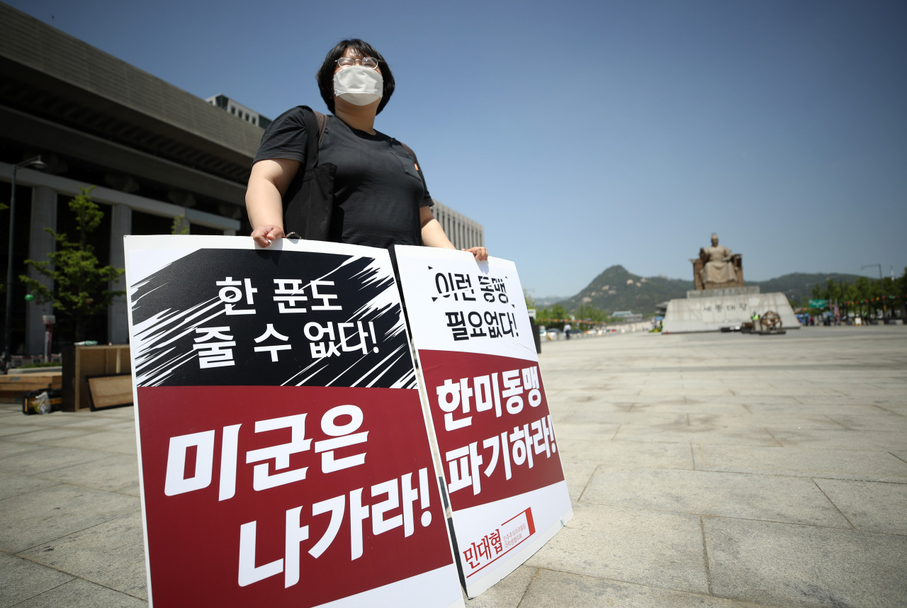 Protester protests against the increase of