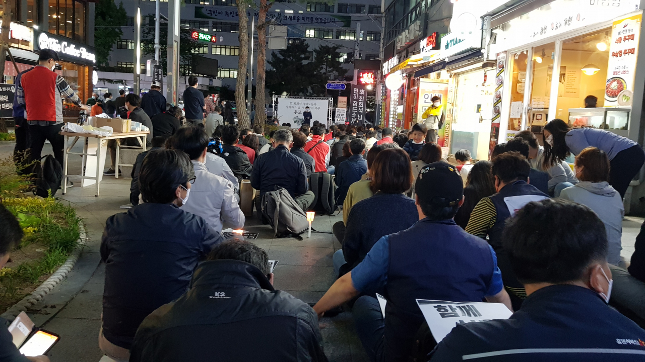 지난 5월 13일 오후 서울 강북구청 앞에서 열린 고 최희석씨 추모행사. [연합]