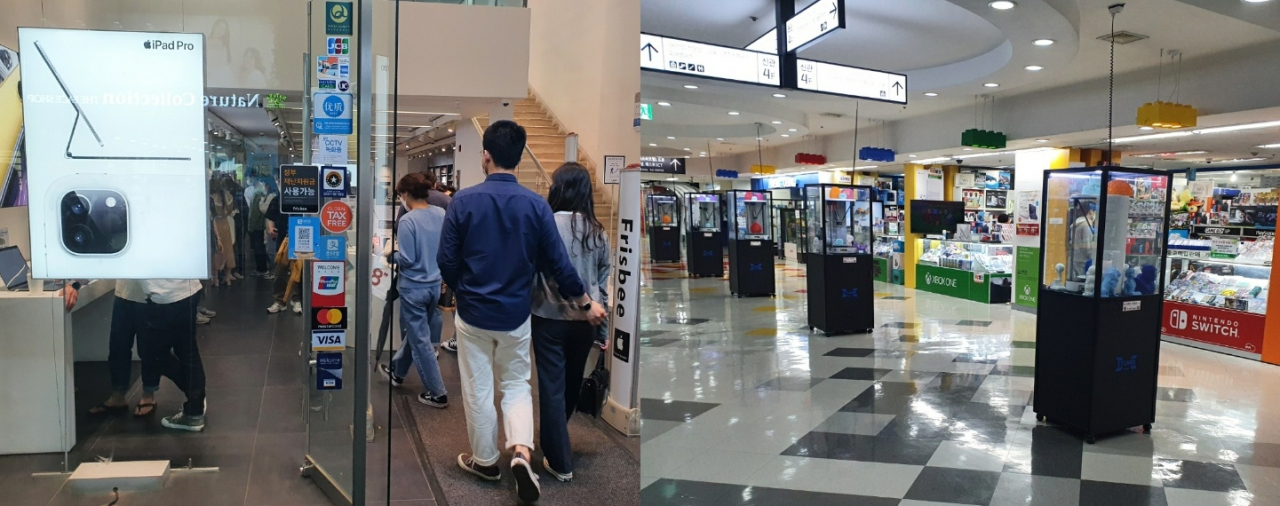 같은 주말 다른 분위기. 지난 16일 오후 8시께 방문한 서울 중구 애플 프리즈비 매장에는 사람들이 몰렸다. 반면 지난 17일 오후 2시께 방문한 서울 용산구 전자랜드에는 손님을 드문드문 찾아볼 수 있을 정도로 한산했다. [사진=김빛나 기자]