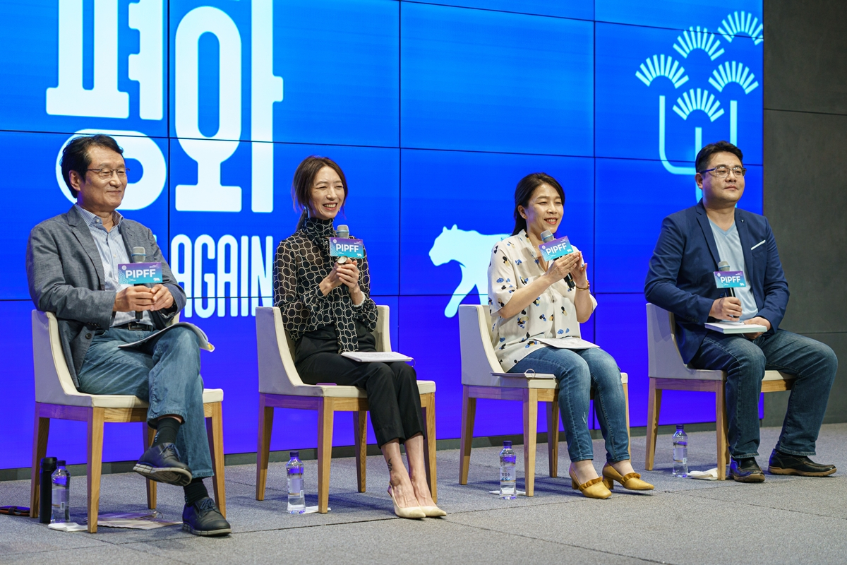 Chairman of the Pyeongchang International Peace Film Festival Moon Sung-keun (from left), festival director Pang Eun-jin and programmers Choi Eun-young and Kim Hyung-seok attend the official press conference on the festival held Tuesday. (PIPFF)