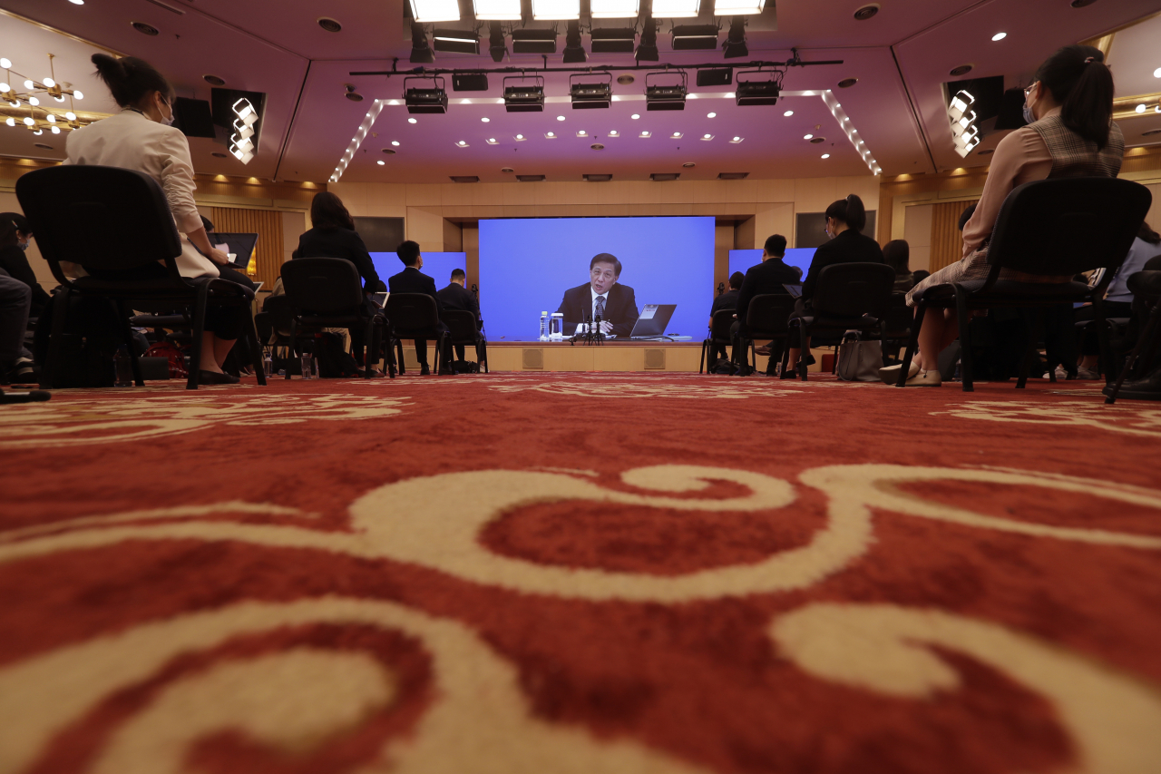장예쑤이(張業遂) 전국인민대표대회 대변인이 21일 기자회견을 하고 있다. [AP]