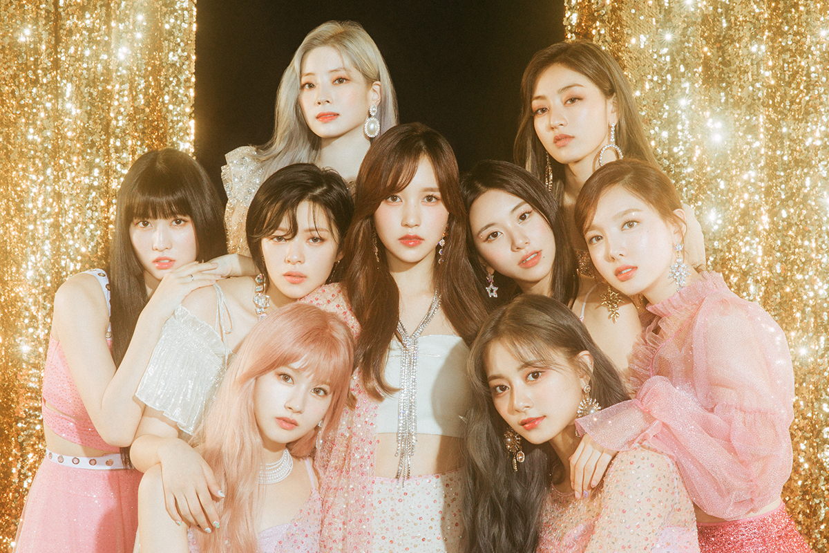 TWICE nine-member group photo after Mina returned for the More and More comeback album promotion cycle