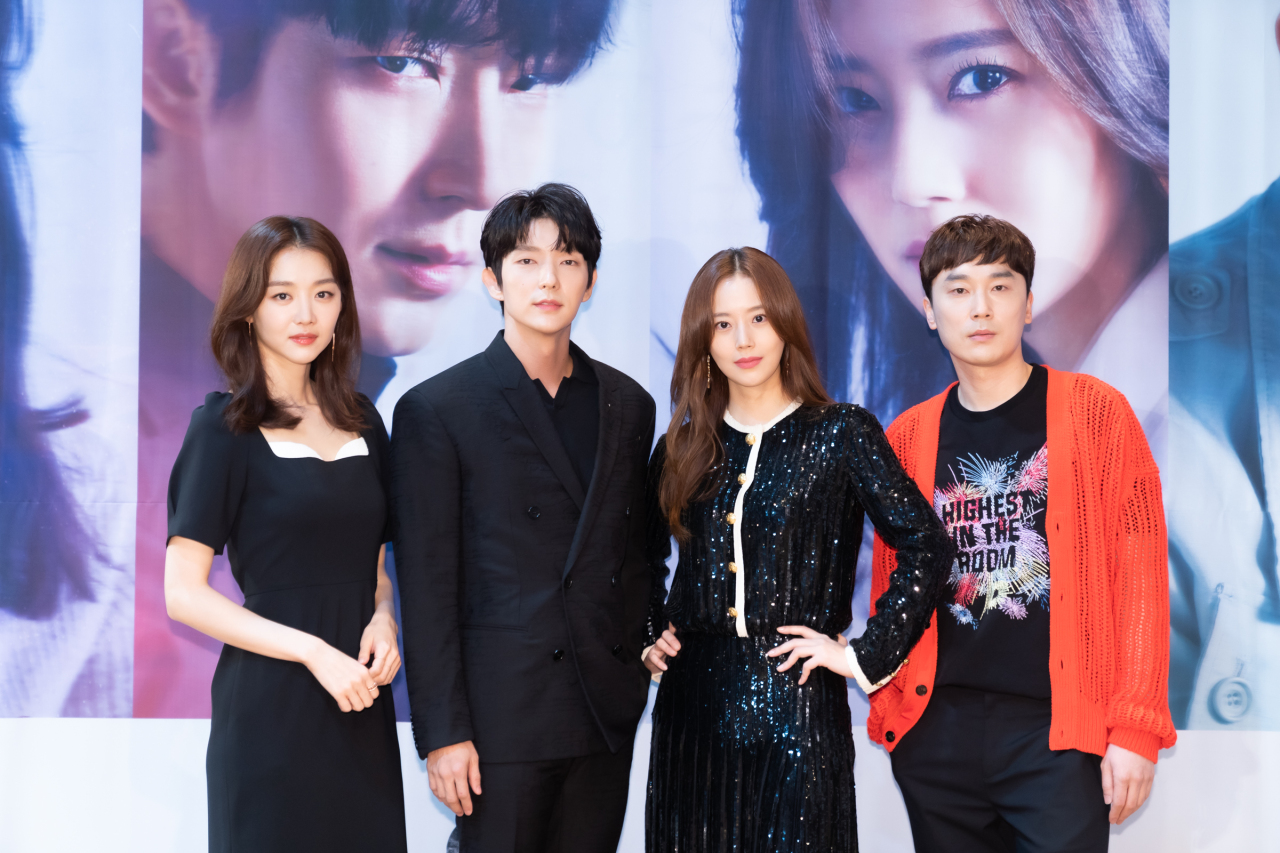 Lead cast members of new tvN series “The Flower of Evil” -- (from left) Jang Hee-jin, Lee Joon-ki, Moon Chae-won and Seo Hyeon-woo -- pose for a picture at a promotional event Wednesday. (tvN)