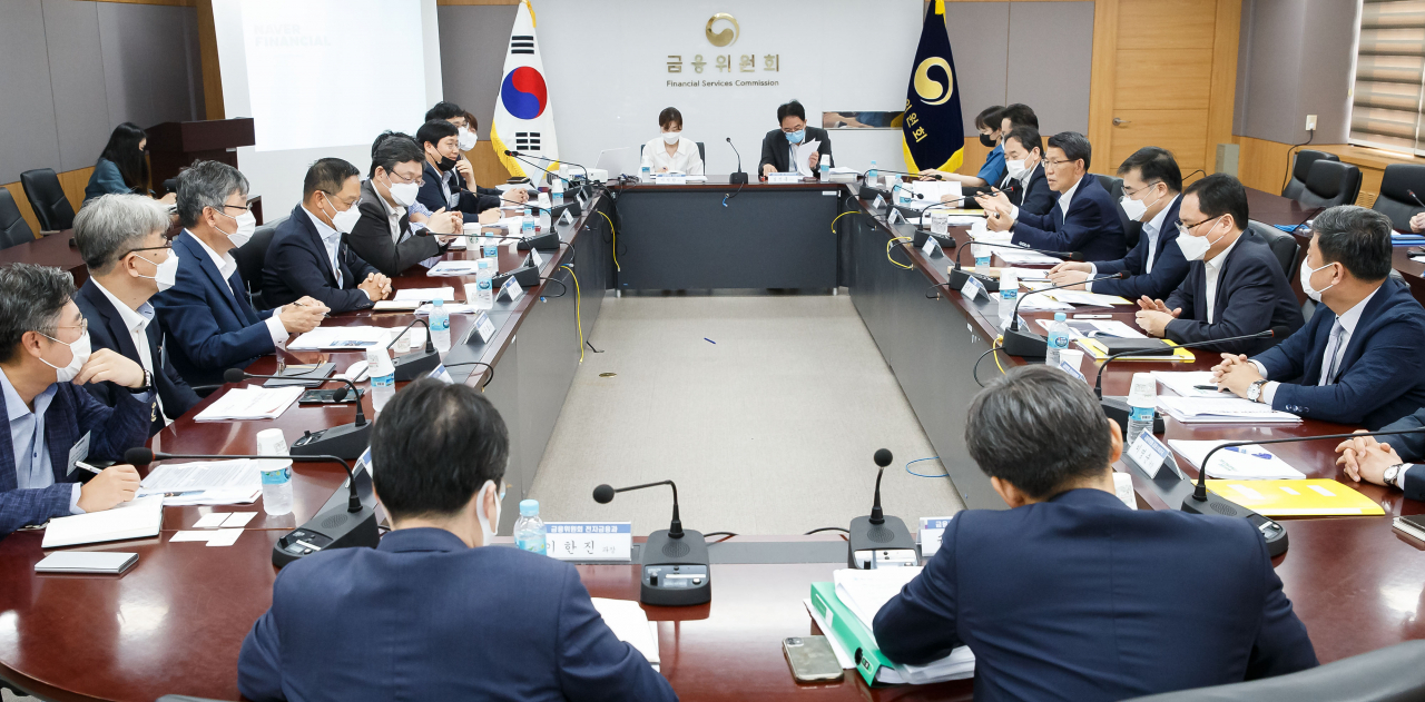 [사진=금융위원회는 21일 서울 종로구 정부서울청사에서 금융산업 업권과 학계 관계자들이 참석한 가운데 금융회사, 빅테크, 핀테크와 금융산업 발전방향 간담회를 개최했다.]