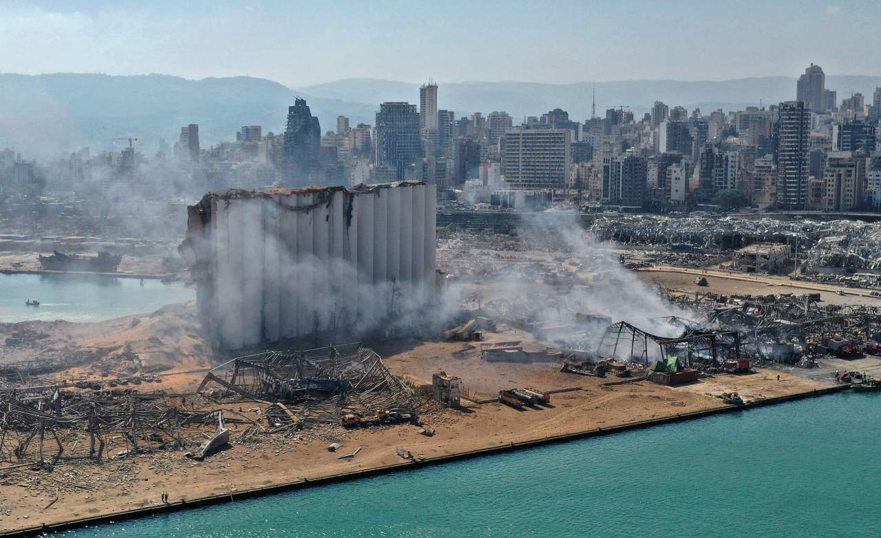 An aerial view shows the massive damage done to Beirut port's grain silos and the area around it on Wednesday, one day after a mega-blast tore through the harbour in the heart of the Lebanese capital with the force of an earthquake, killing more than 100 people and injuring over 4,000. (AFP-Yonhap)