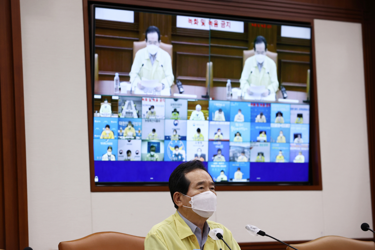 정세균 국무총리가 30일 정부서울청사에서 열린 코로나19 대응 중앙재난안전대책본부 회의에서 발언하고 있다. [연합］