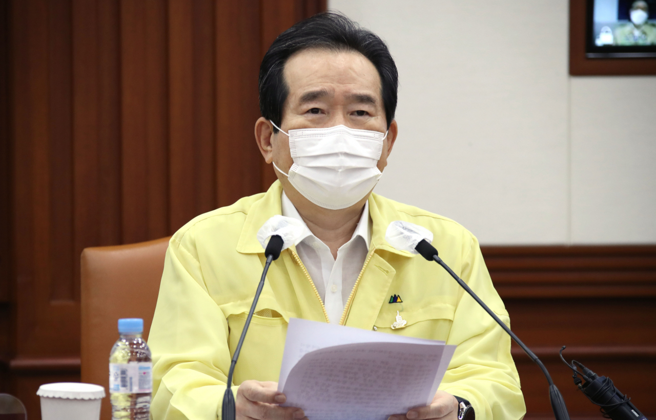 정세균 국무총리가 11일 정부서울청사에서 열린 코로나19 대응 중앙재난안전대책본부 회의에서 모두발언을 하고 있다. [연합］