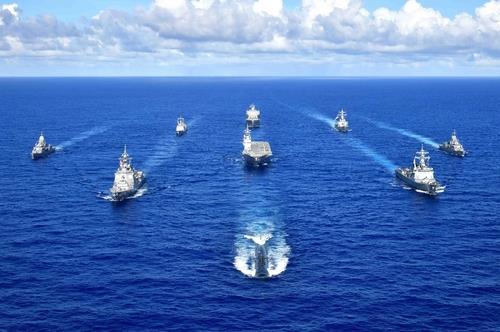 This photo from the website of the United States Seventh Fleet shows the naval forces of South Korea, the United States, Japan and Australia engaged in a joint maritime exercise in the Pacific waters near Guam, scheduled to run from Sept. 11-13, 2020. (Yonhap)