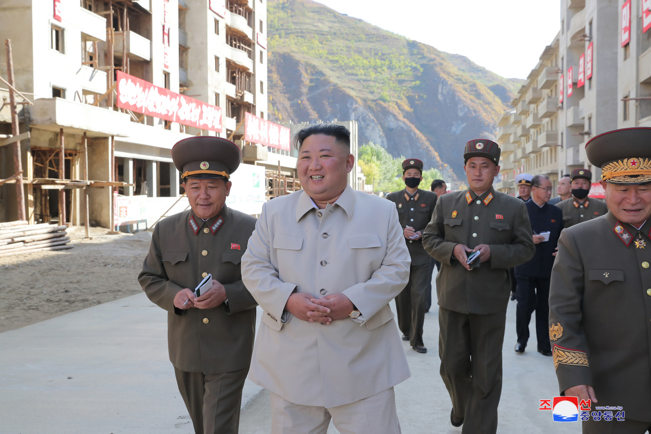 North Korean leader Kim Jong-un inspects typhoon-hit Komdok area in South Hamgyong Province, according to the Korea Central News Agency report on Wednesday. (KCNA-Yonhap)