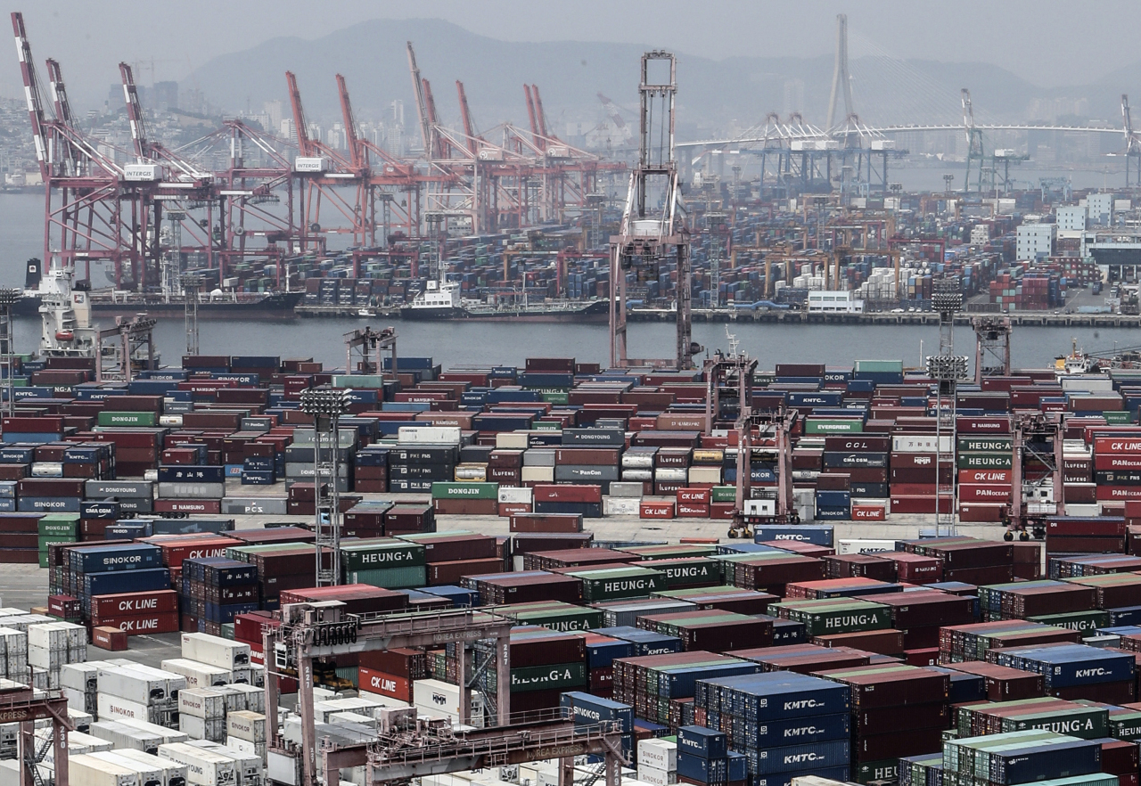 This file photo, taken June 4, 2020, shows stacks of import-export cargo containers at South Korea's largest seaport in Busan, 450 kilometers southeast of Seoul. (Yonhap)