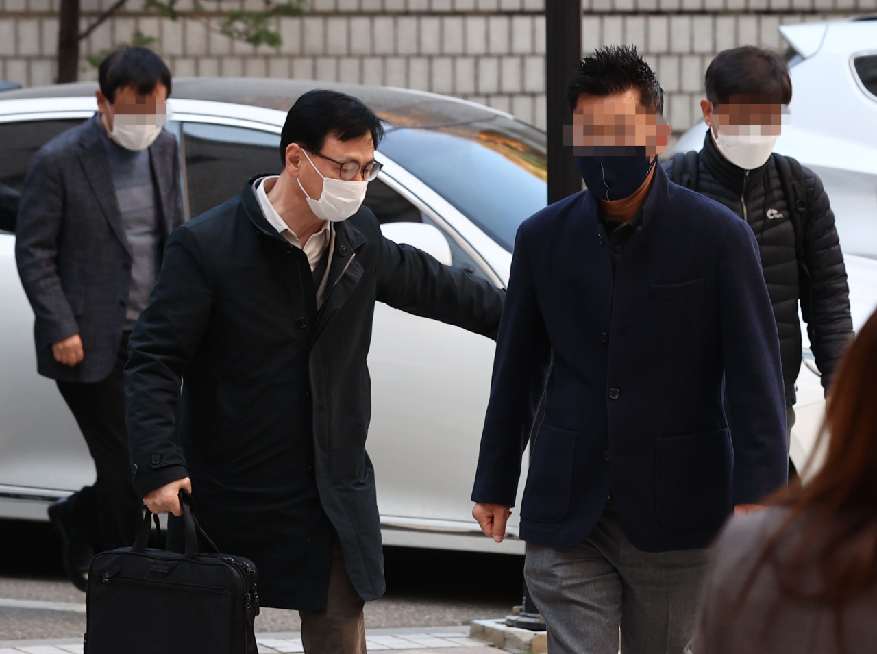 1조 원대 옵티머스자산운용 펀드 사기와 관련해 박모 전 해덕파워웨이 대표, 세보테크 강모 총괄이사, M사 회장 오모씨. [연합]