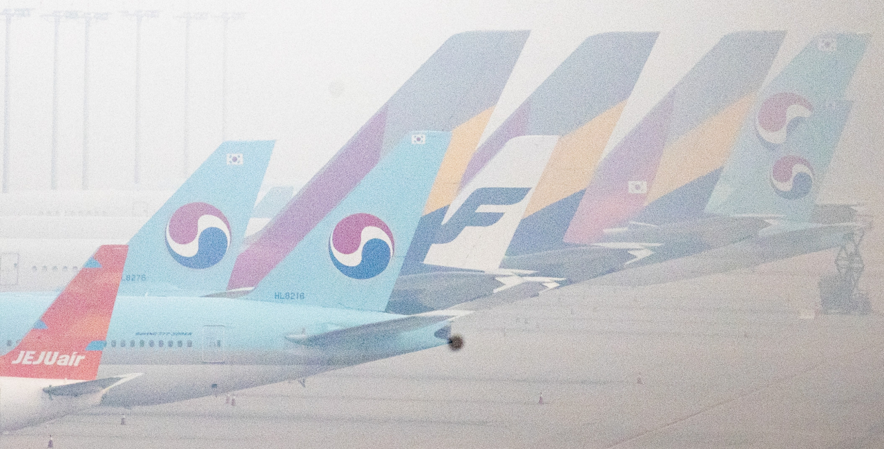 인천국제공항 계류장에 세워진 대한항공과 아시아나항공 여객기 모습. [연합뉴스]