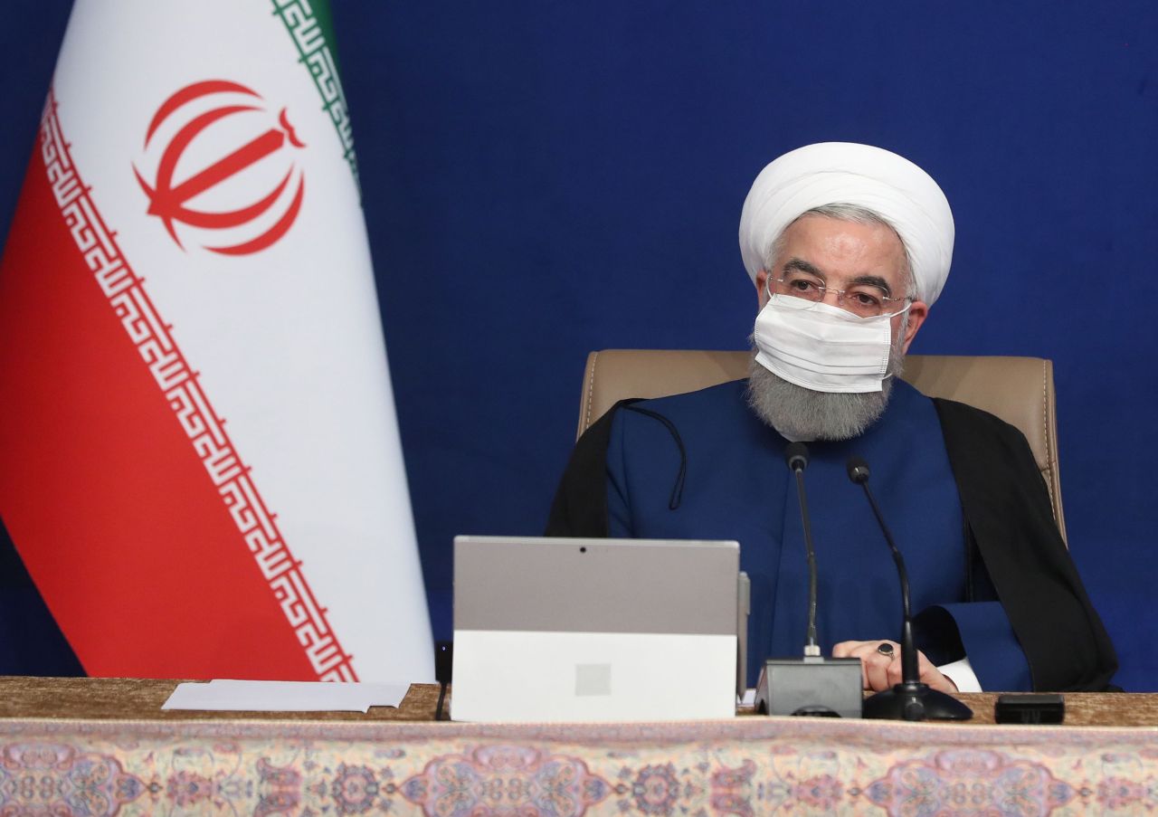 A handout picture provided by the Iranian presidency shows President Hassan Rouhani wearing a protective mask due to the COVID-19 coronavirus pandemic while chairing a cabinet meeting in the capital Tehran on November 11. (AFP-Yonhap)