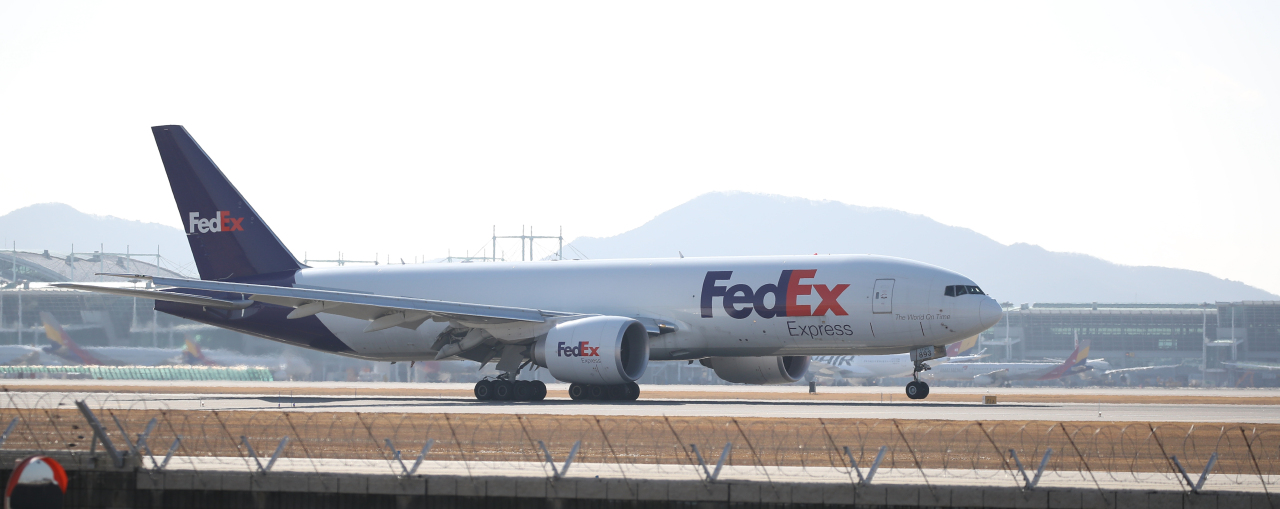 Aircraft carrying vaccines for US Forces Korea lands at the Incheon International Airport on Friday. (Yonhap)